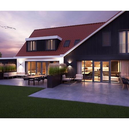 Modern 8 person villa in De Cocksdorp  Exteriör bild